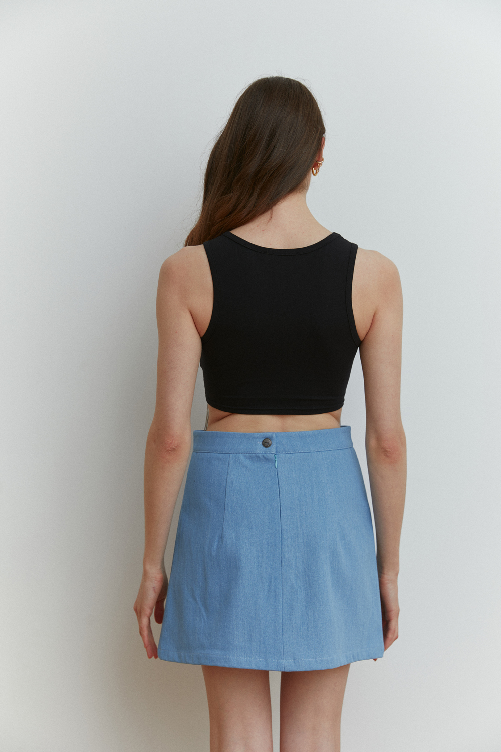 Black sleeveless top with silver bead fringe