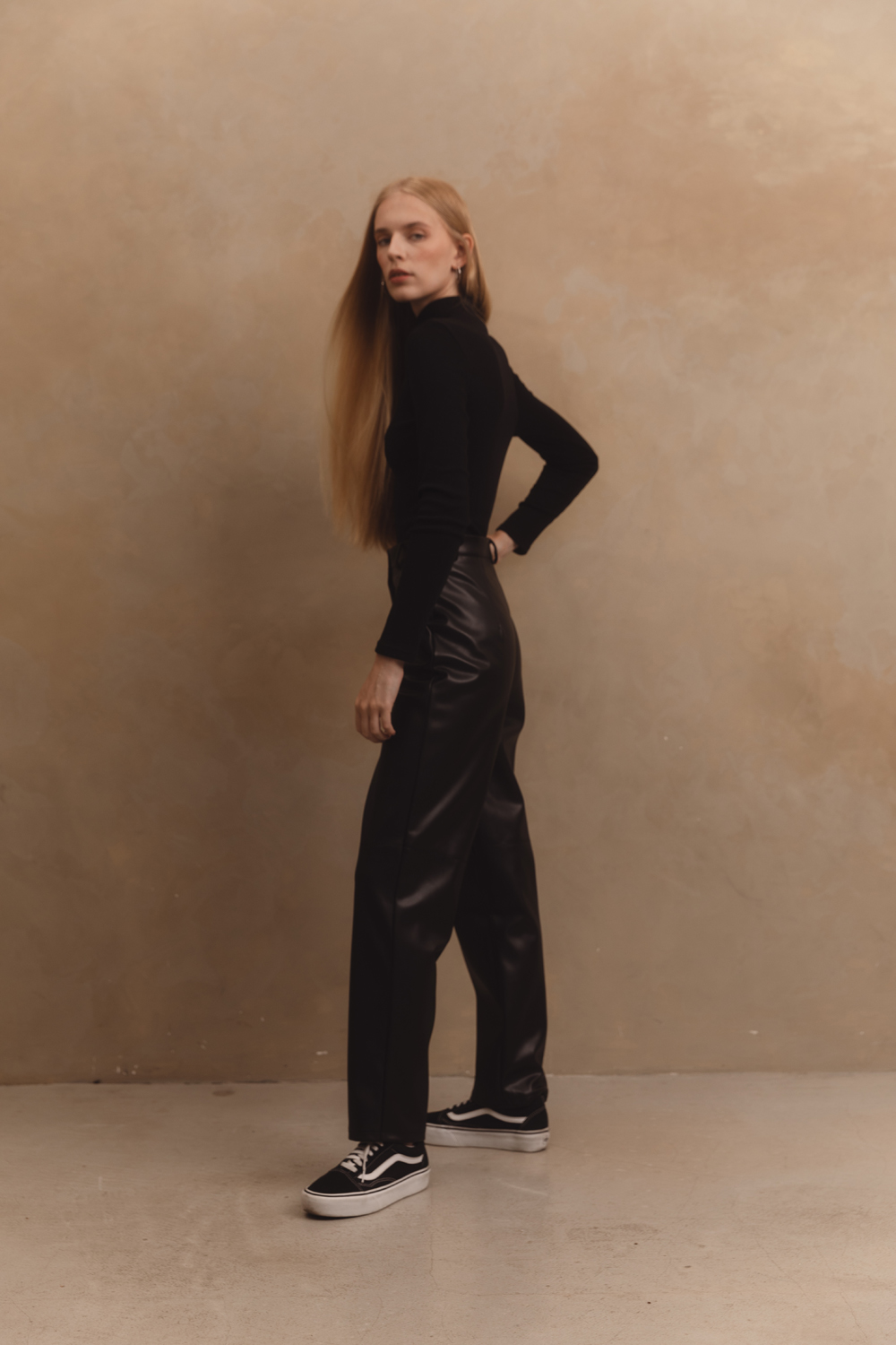 Black straight trousers in eco-leather