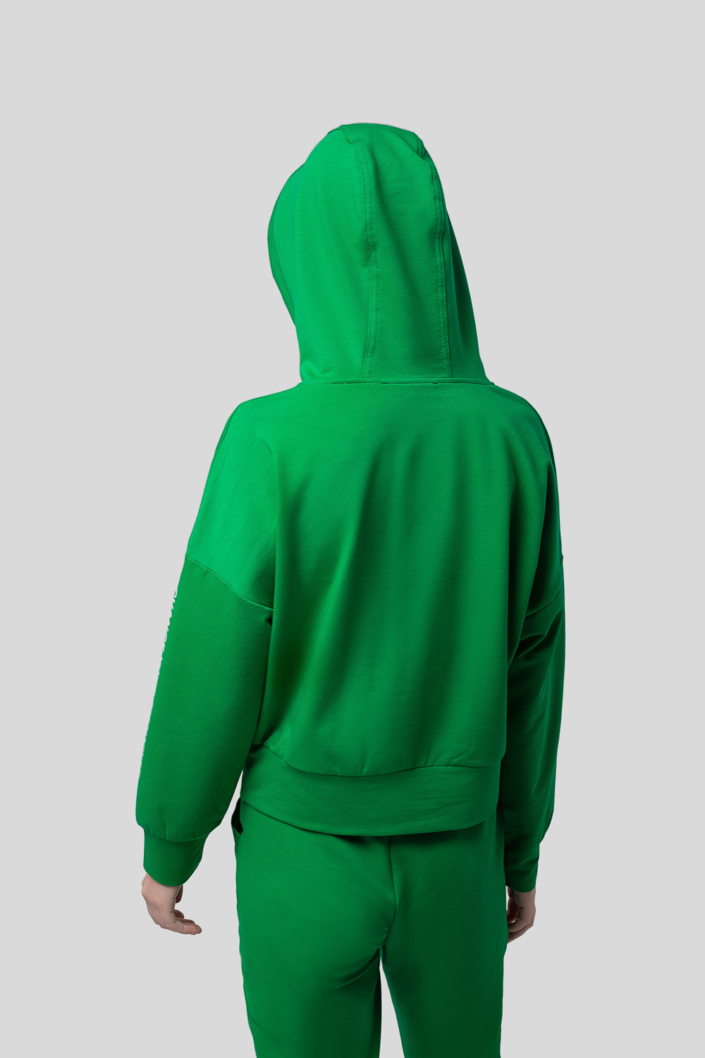 Green hoodie with a slogan