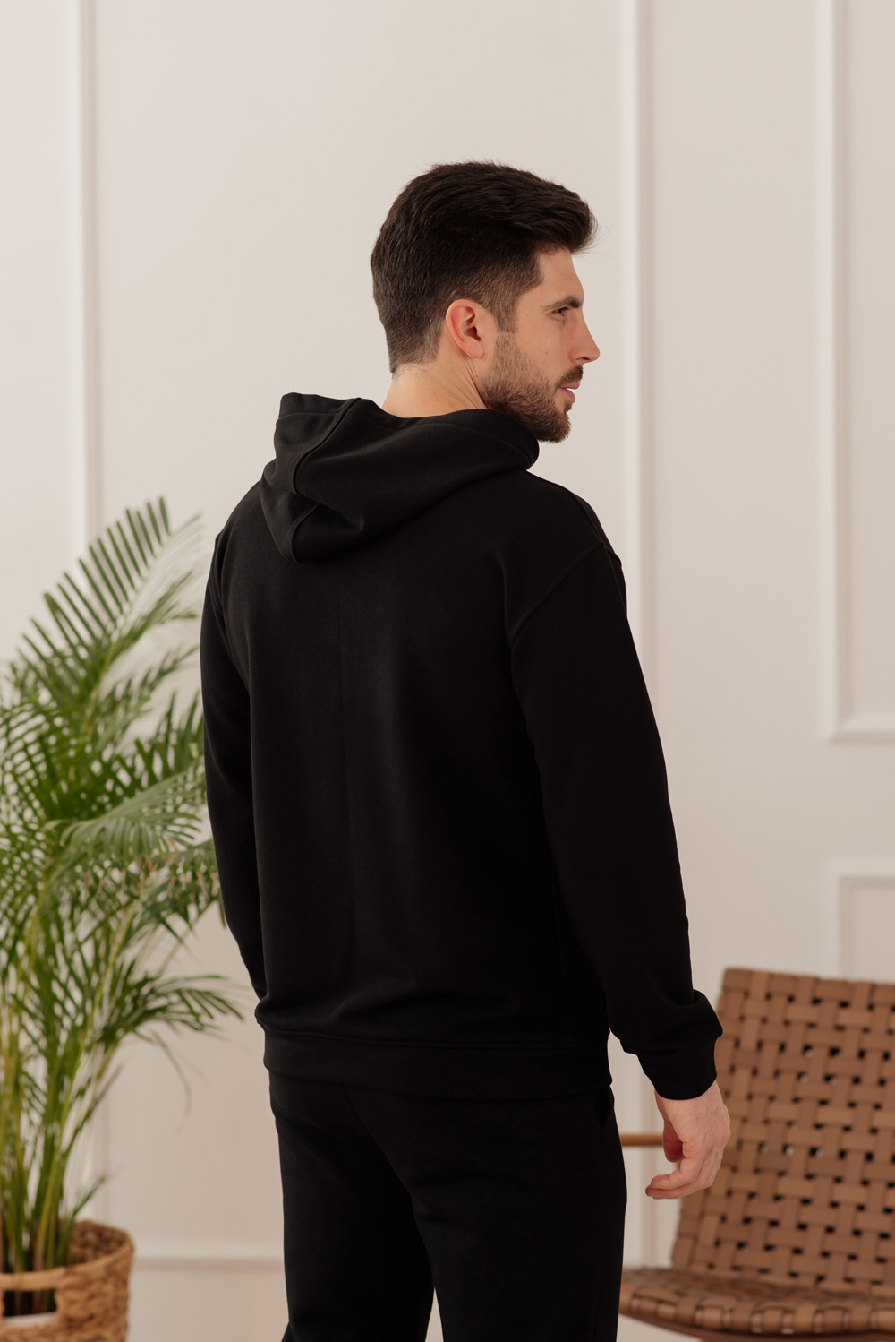 Black sweatshirt with kangaroo pocket and hood
