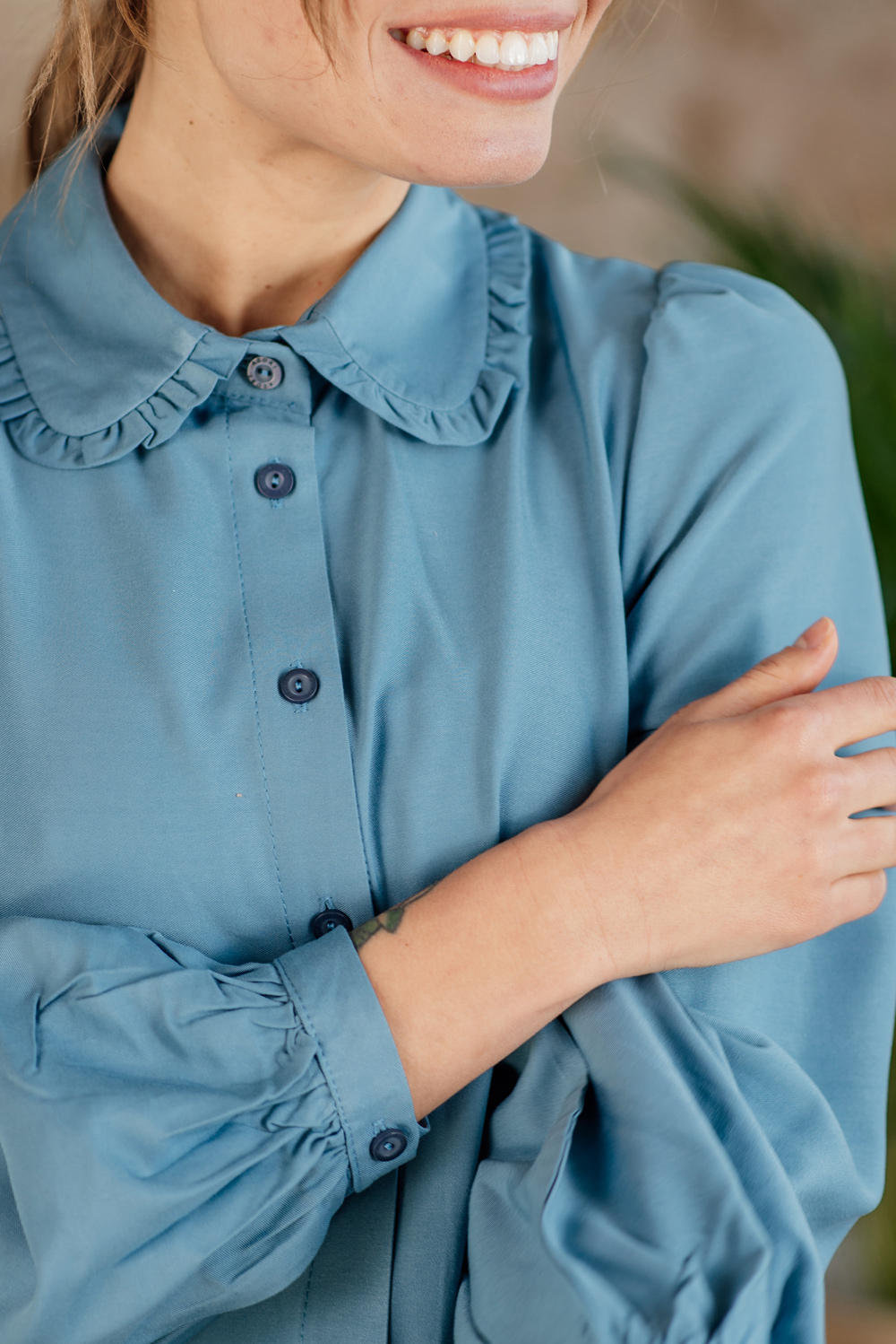 Blue dress with ruffles and collar