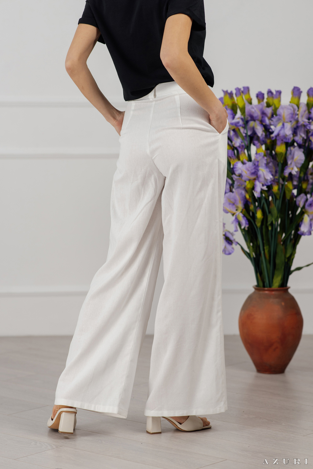 White linen trousers with tucks 