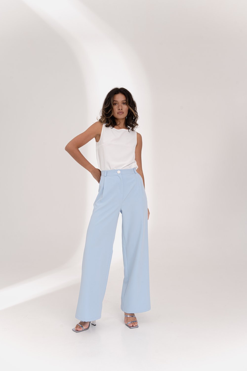 Light blue wide-leg trousers with side pockets