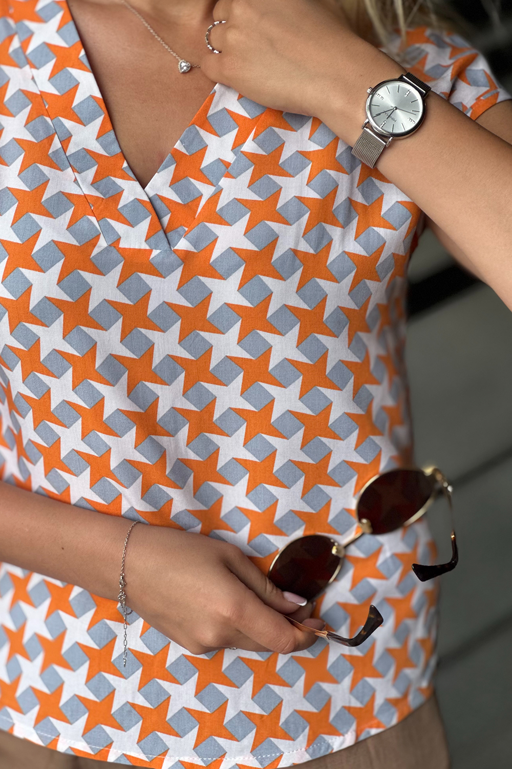 Lightweight orange staple blouse