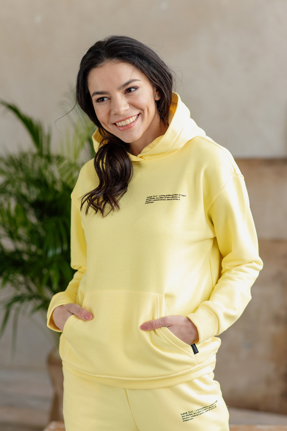 Yellow sweatshirt with slogan