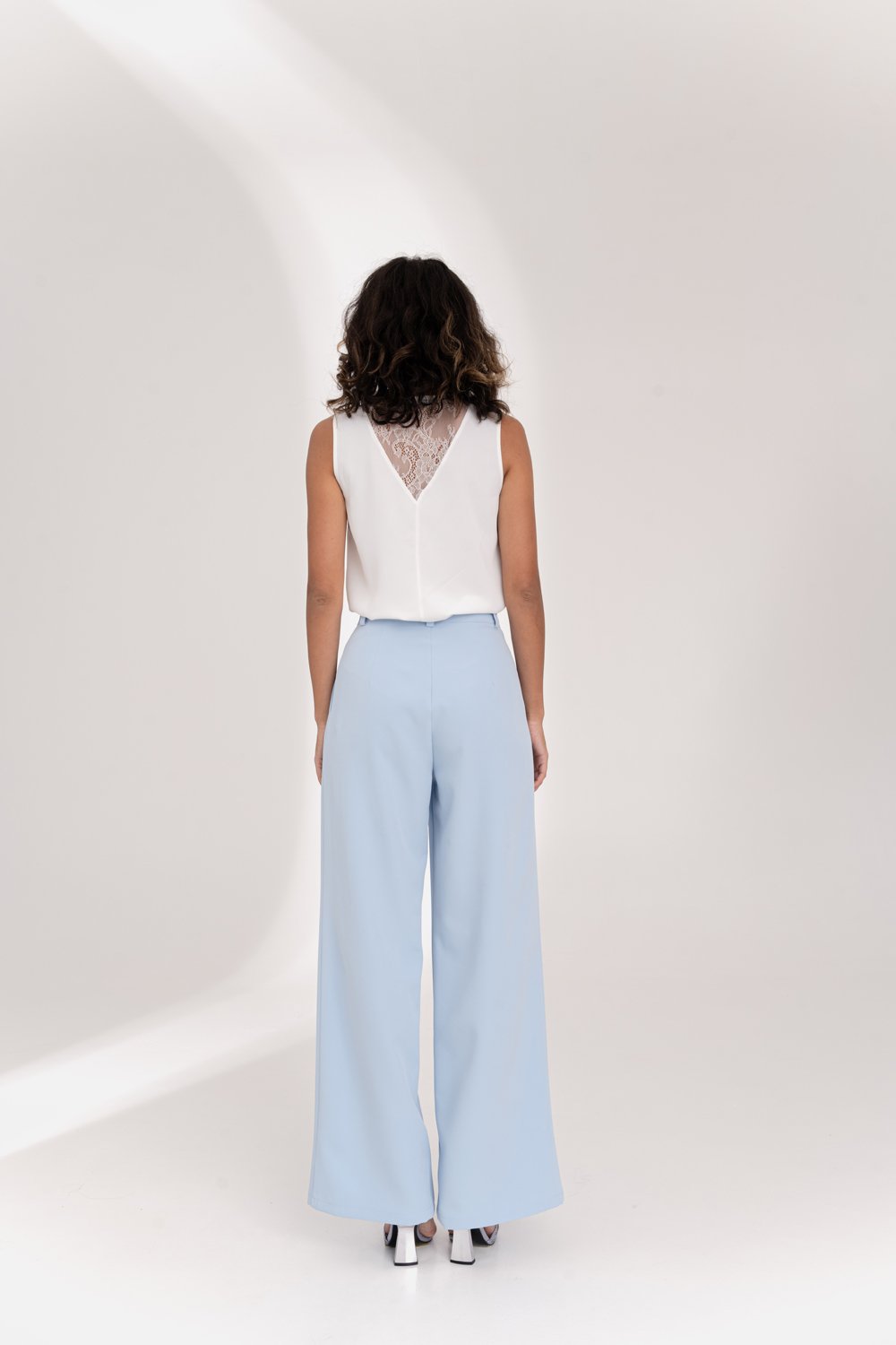 Light blue wide-leg trousers with side pockets