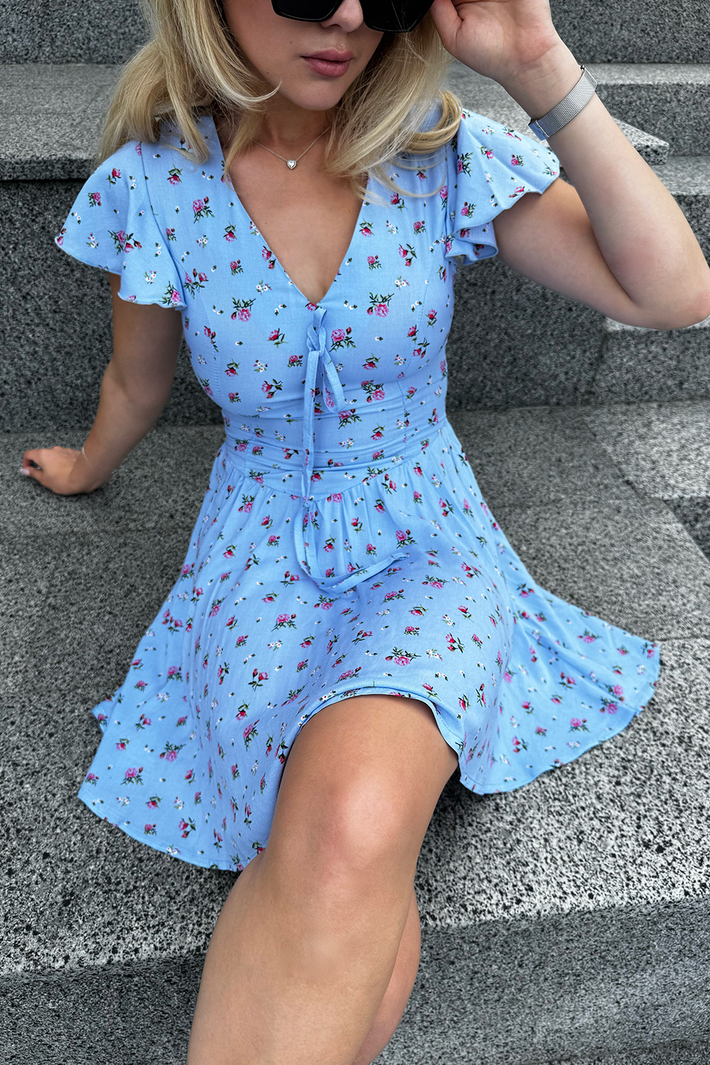Light blue fitted dress with cap sleeves