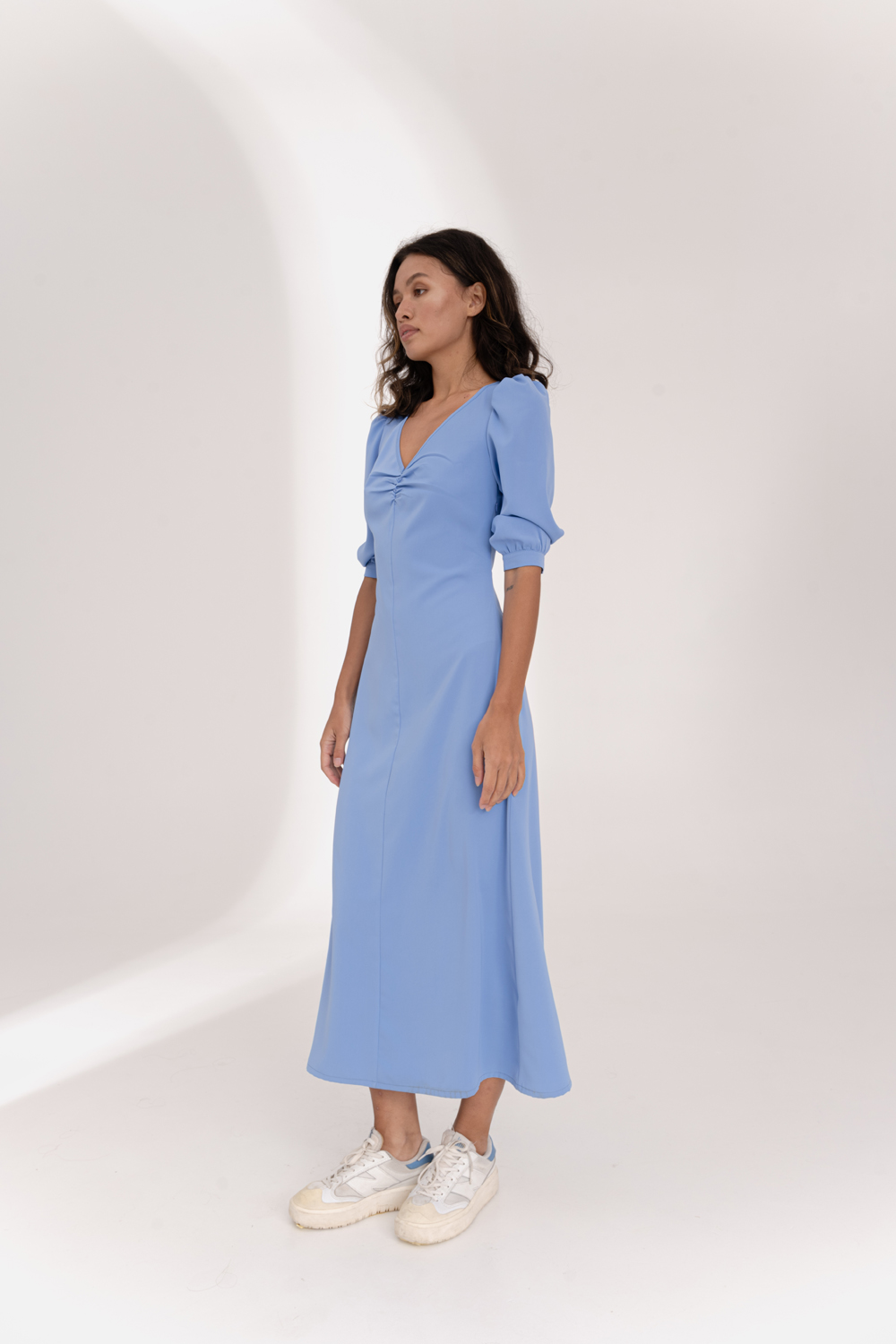 Blue flowy dress with ruching at the chest