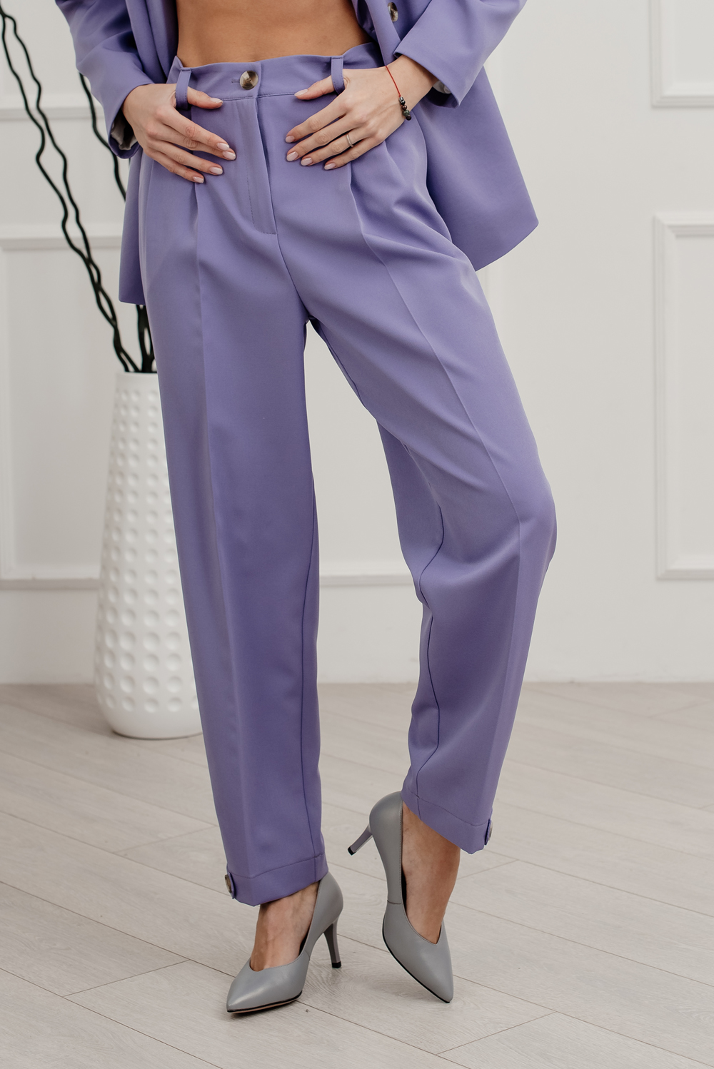 Purple trousers with pleated waist