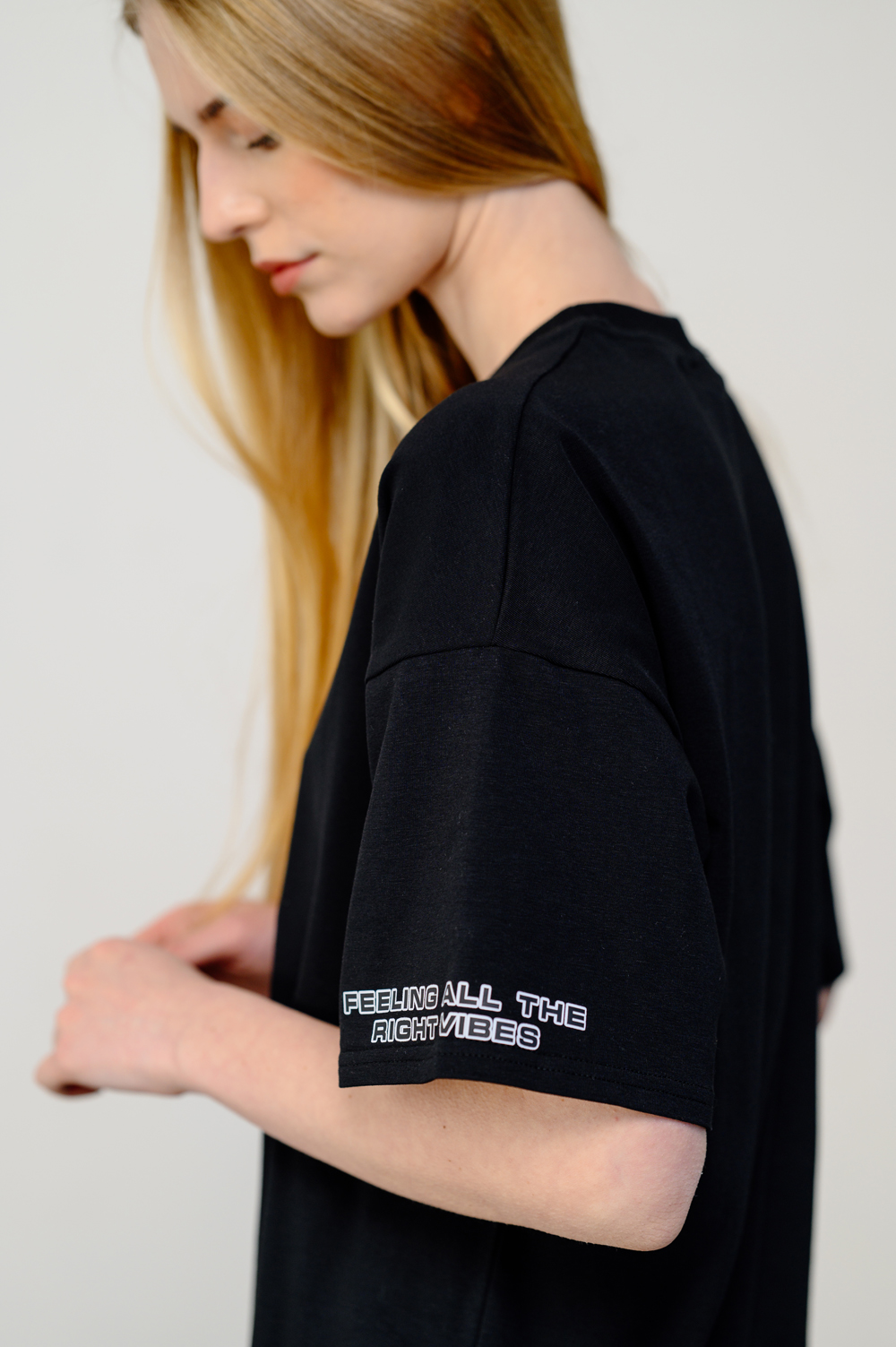 Black oversized T-shirt with sticker