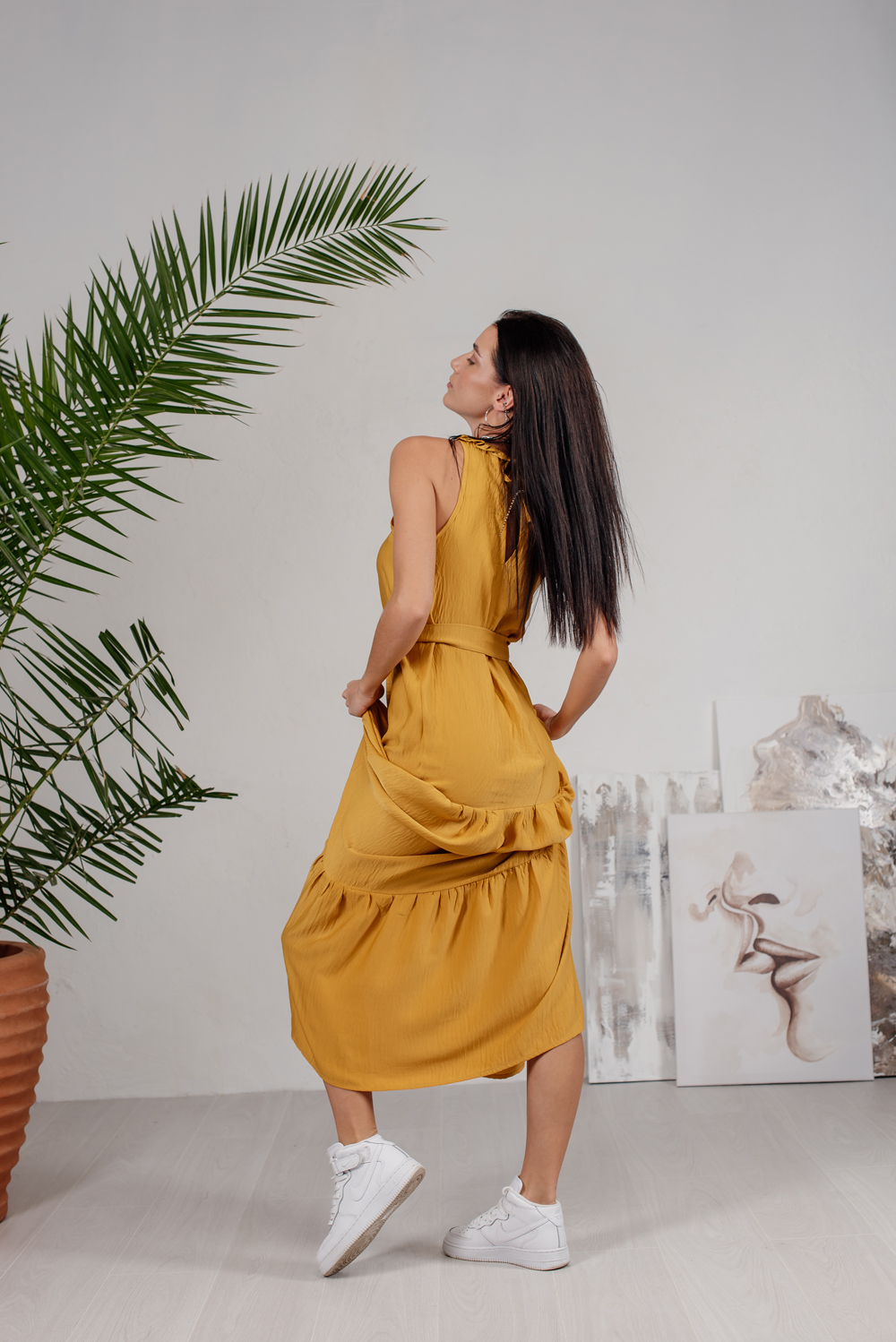 Amber tiered floor length dress with open shoulders and ruffles