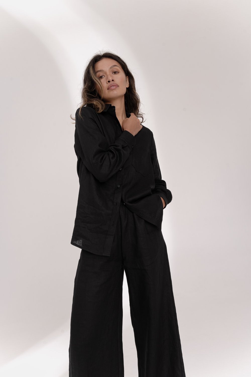 Black linen trousers with elastic waistband