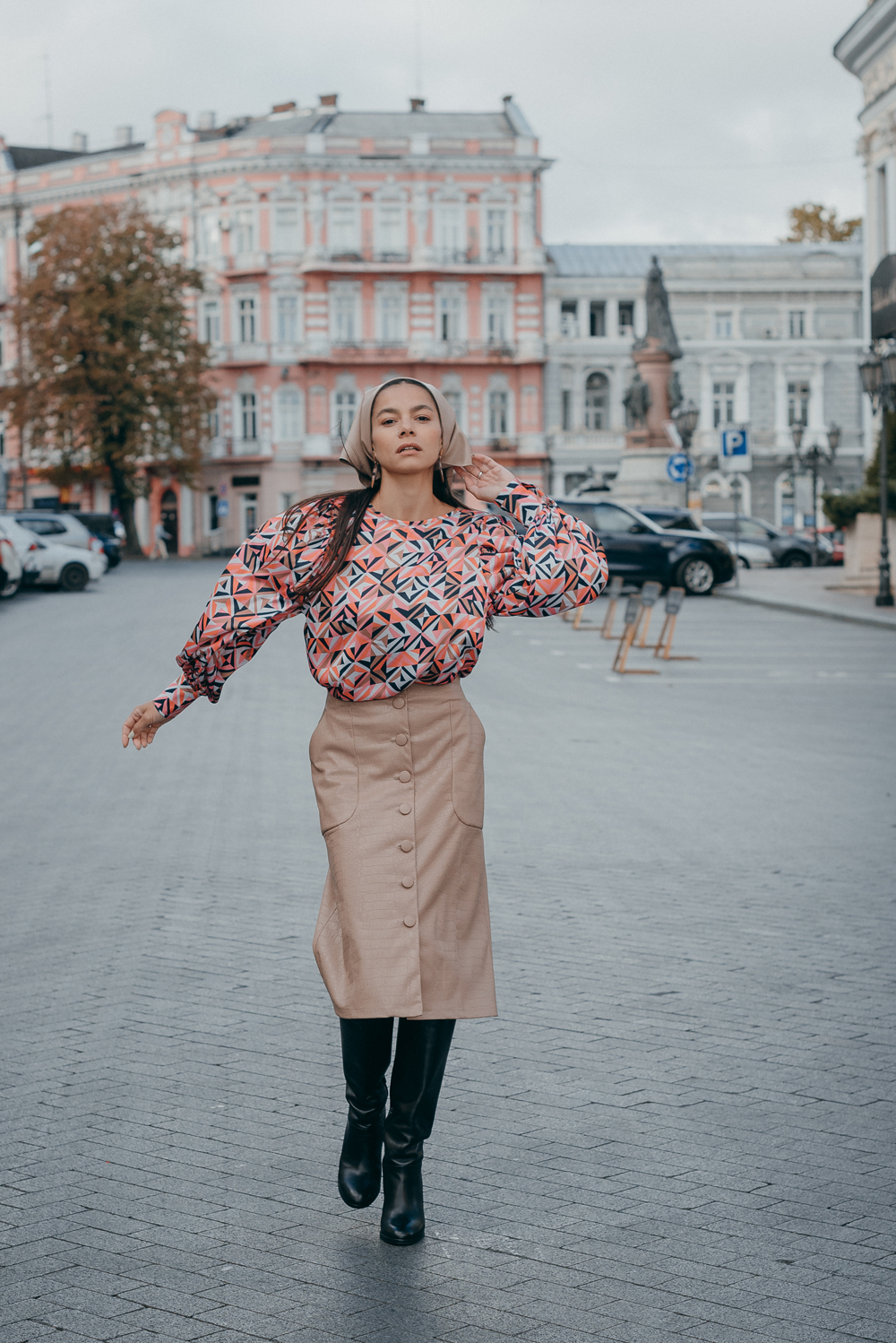 Midi skirt made of eco leather with buttons