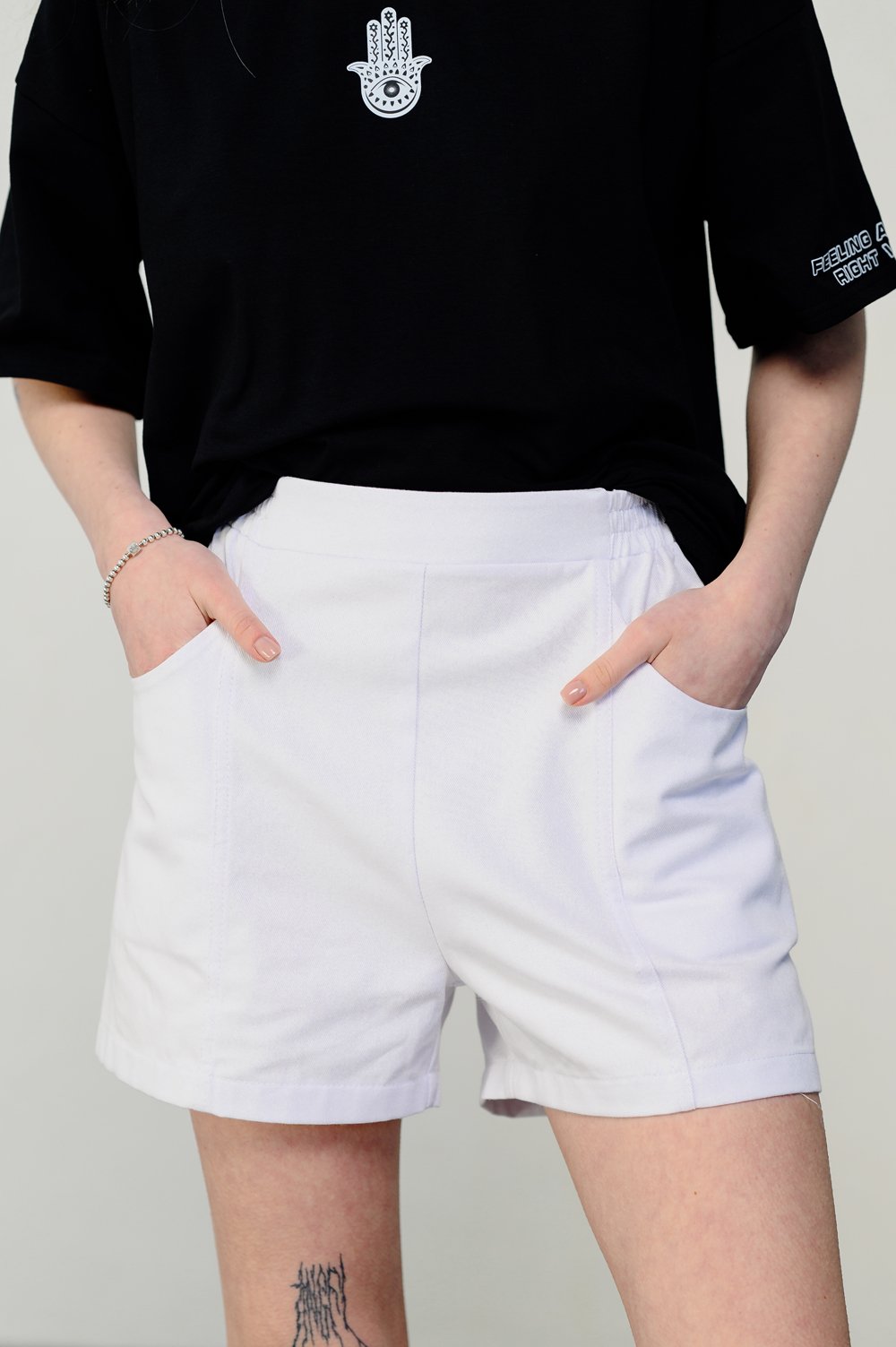 White loose shorts with elastic waistband