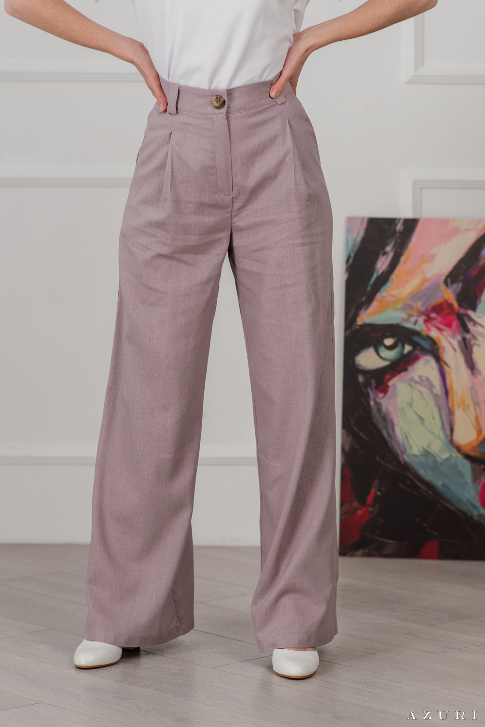 Льняные брюки с широкими штанинами и защипами