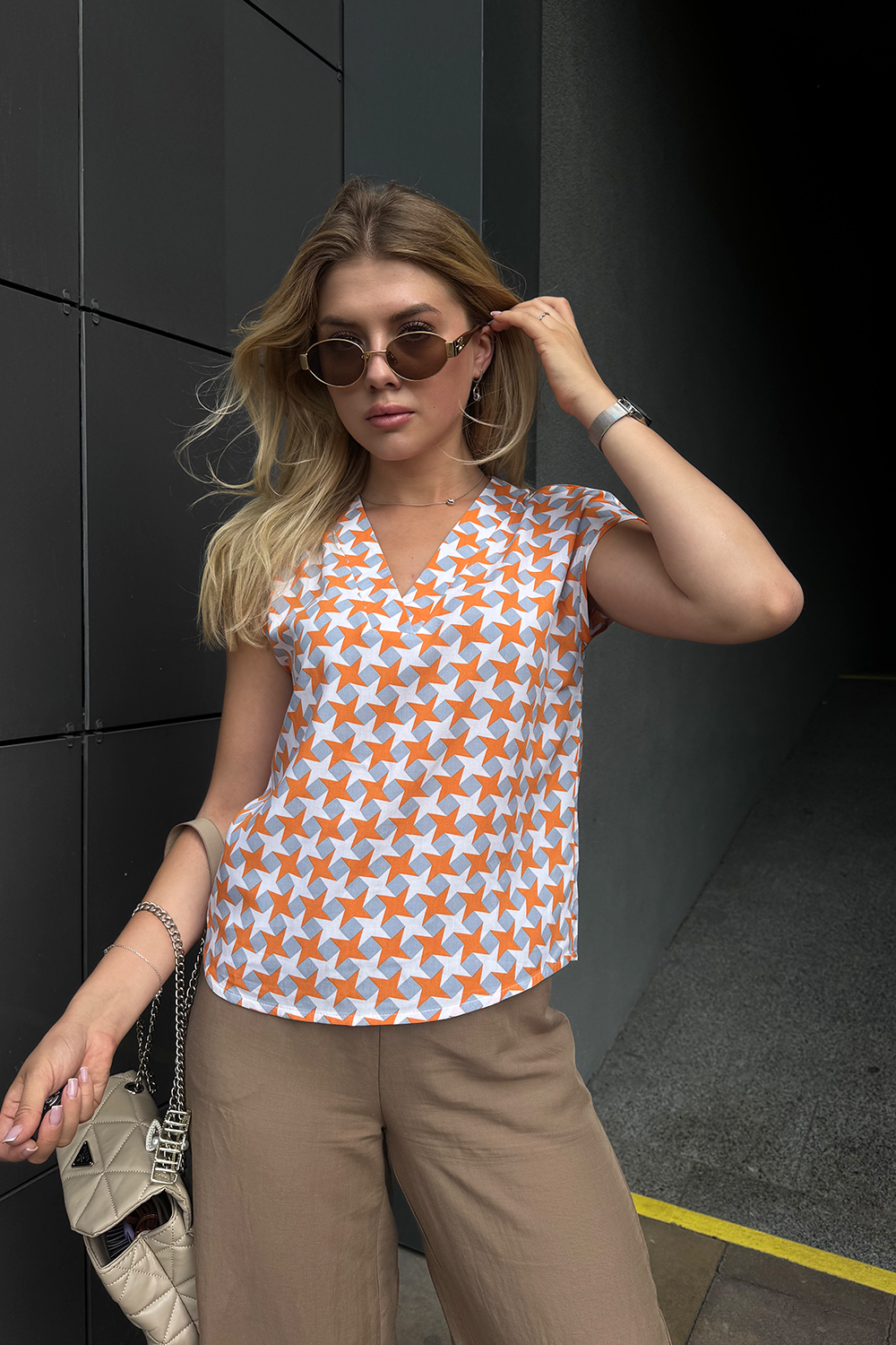 Lightweight orange staple blouse