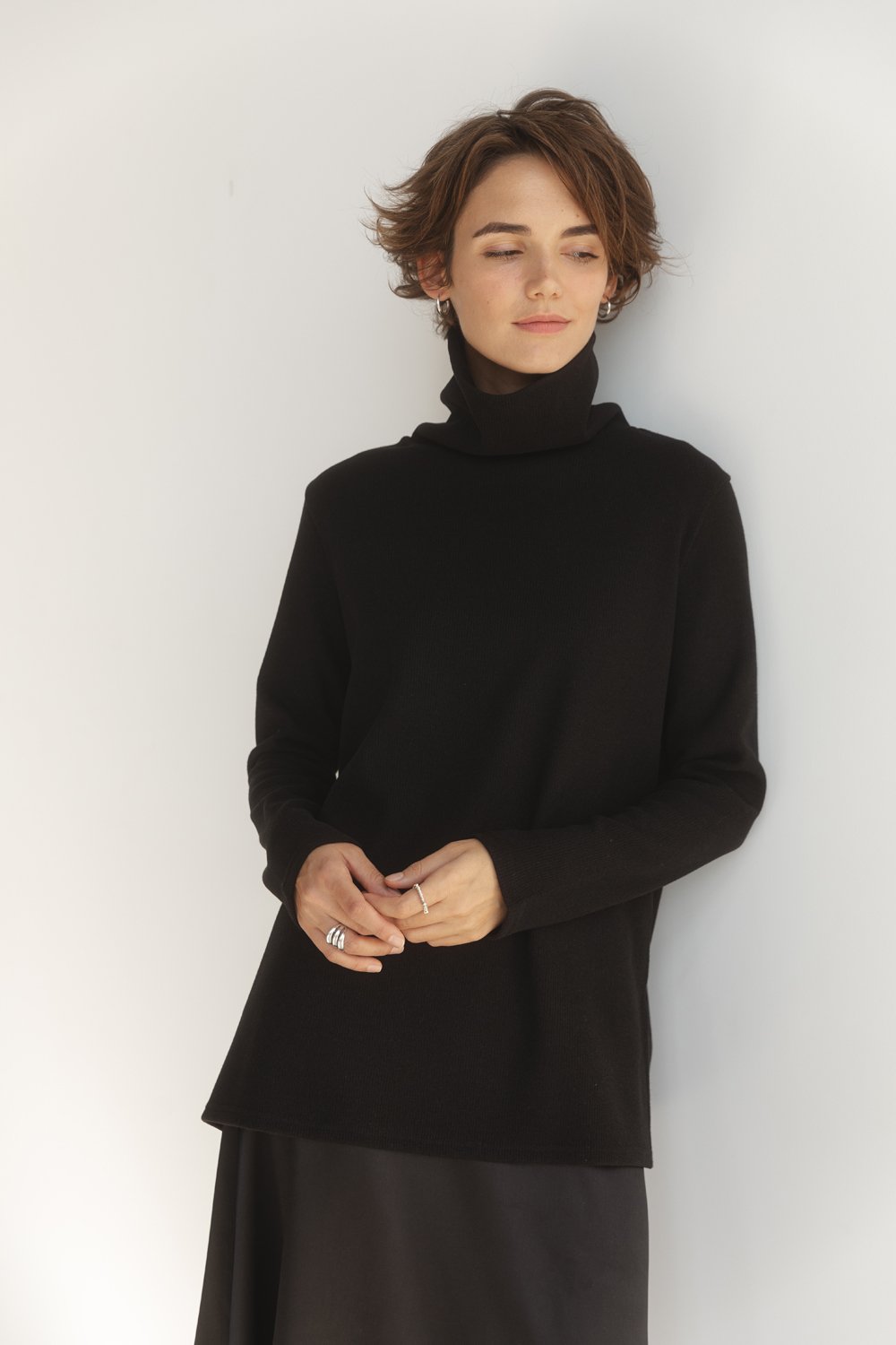 Black oversized knit sweater with side slits