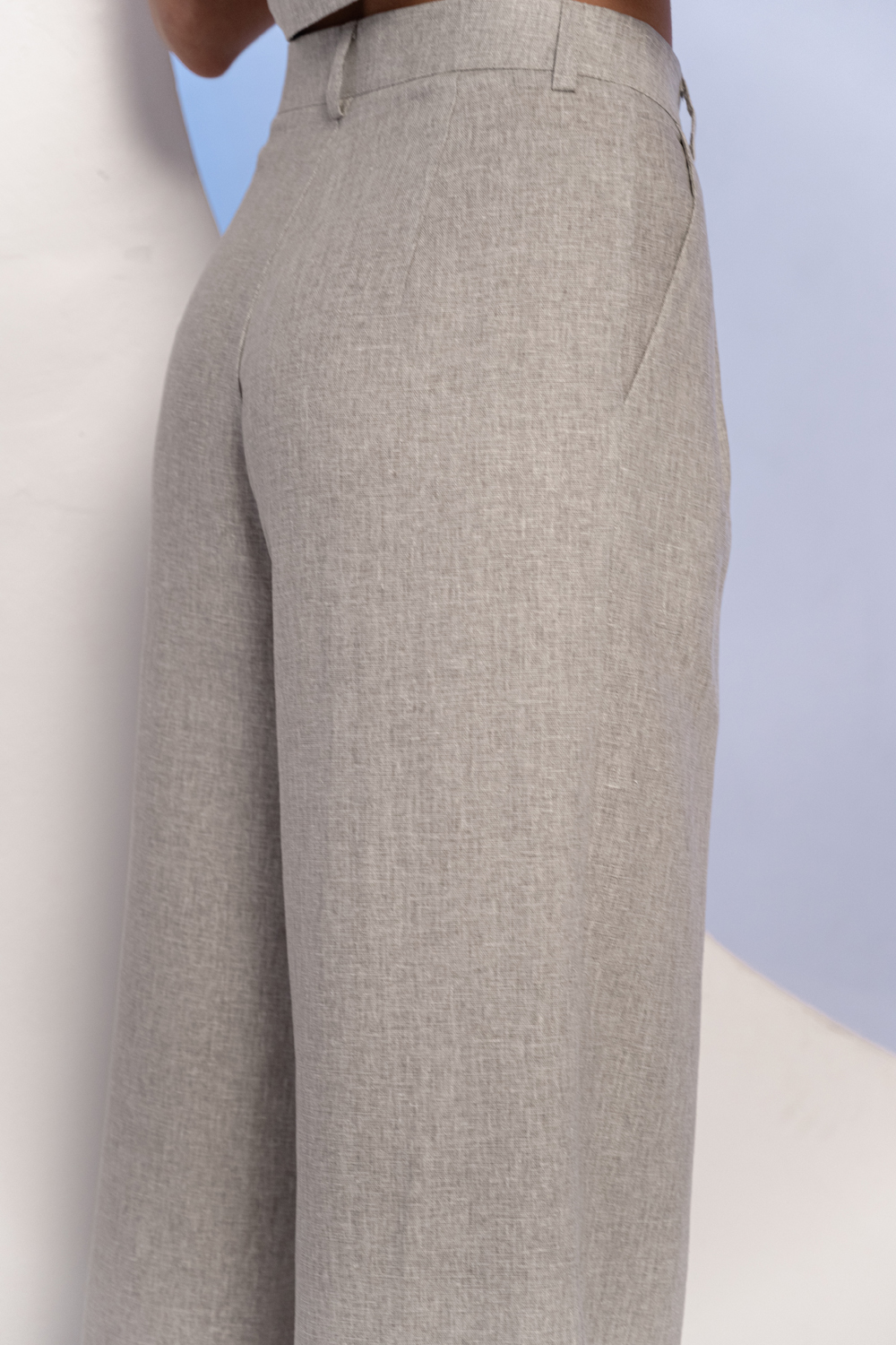Light gray wide-leg linen trousers with waistband