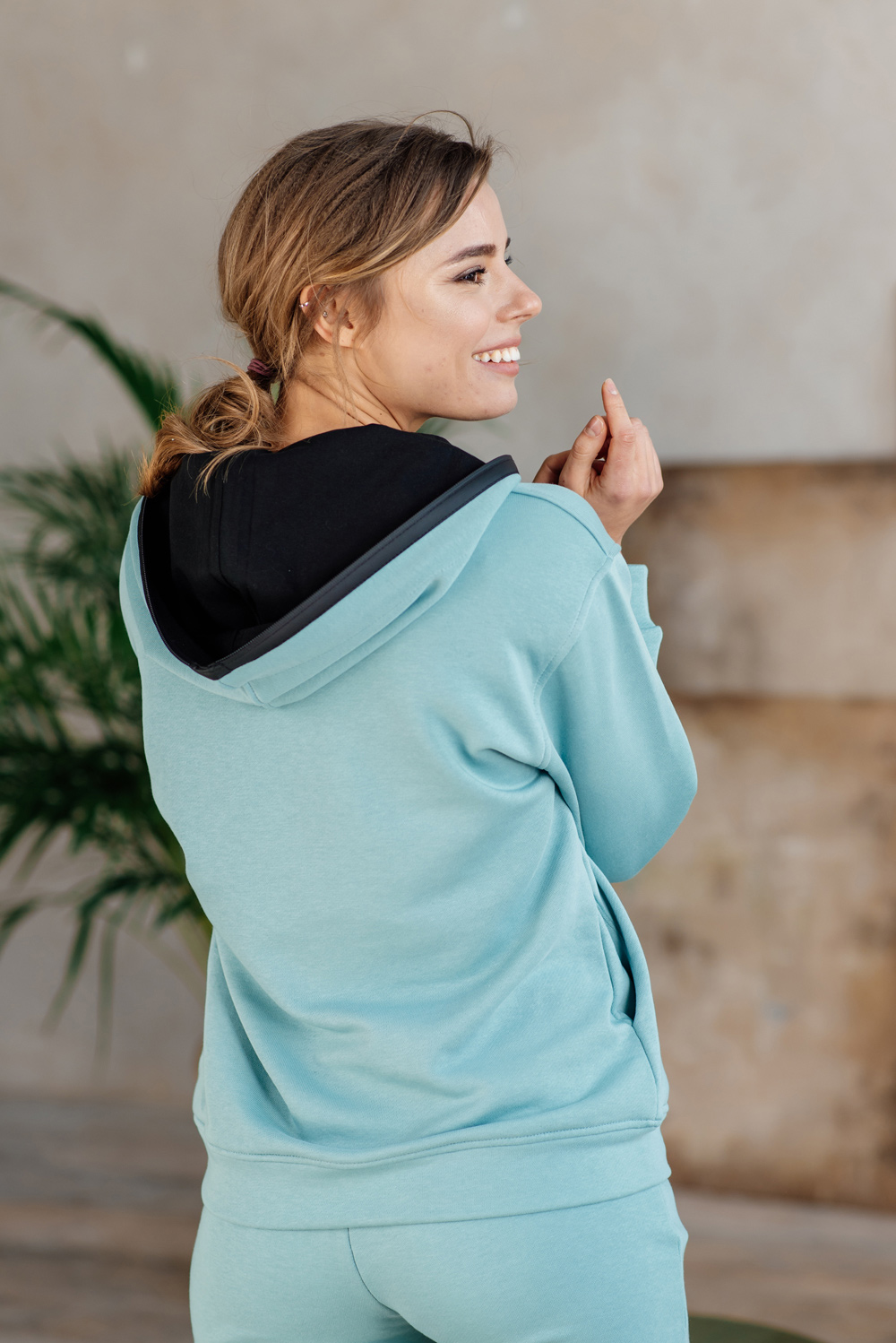 Sweatshirt with a zipper and a hood