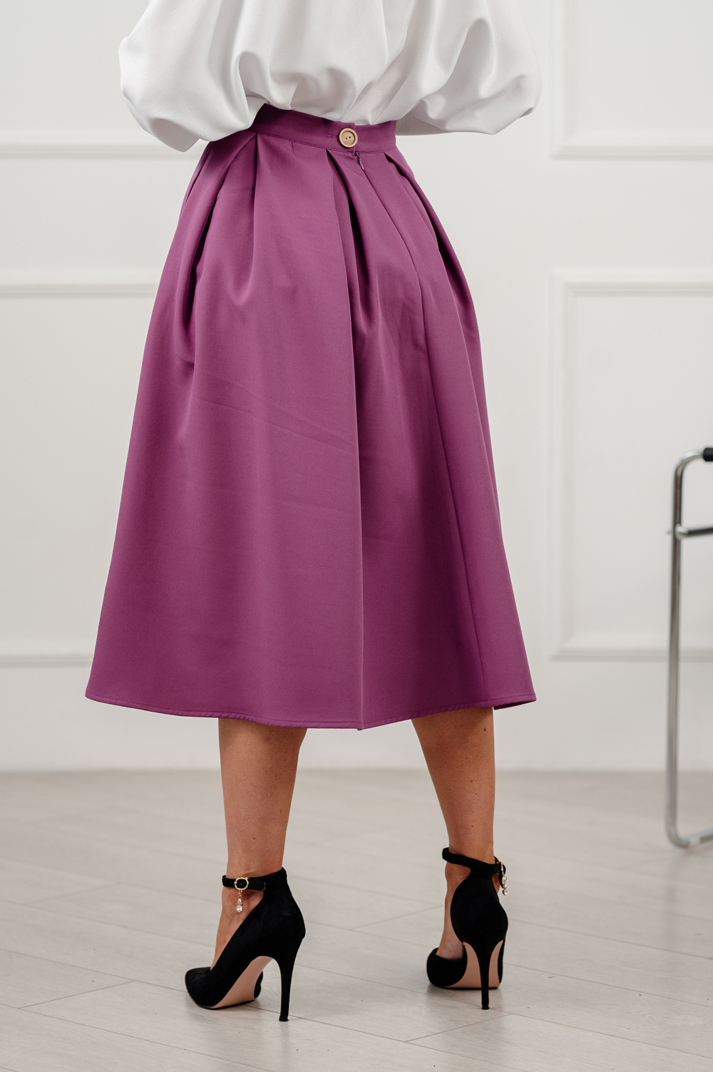 Aubergine coloured flared skirt below the knee