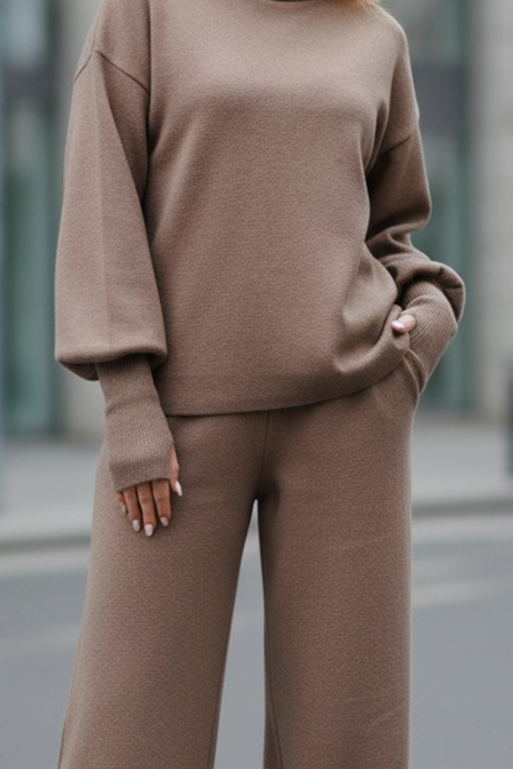 A walking suit made of soft knitted angora in the color 