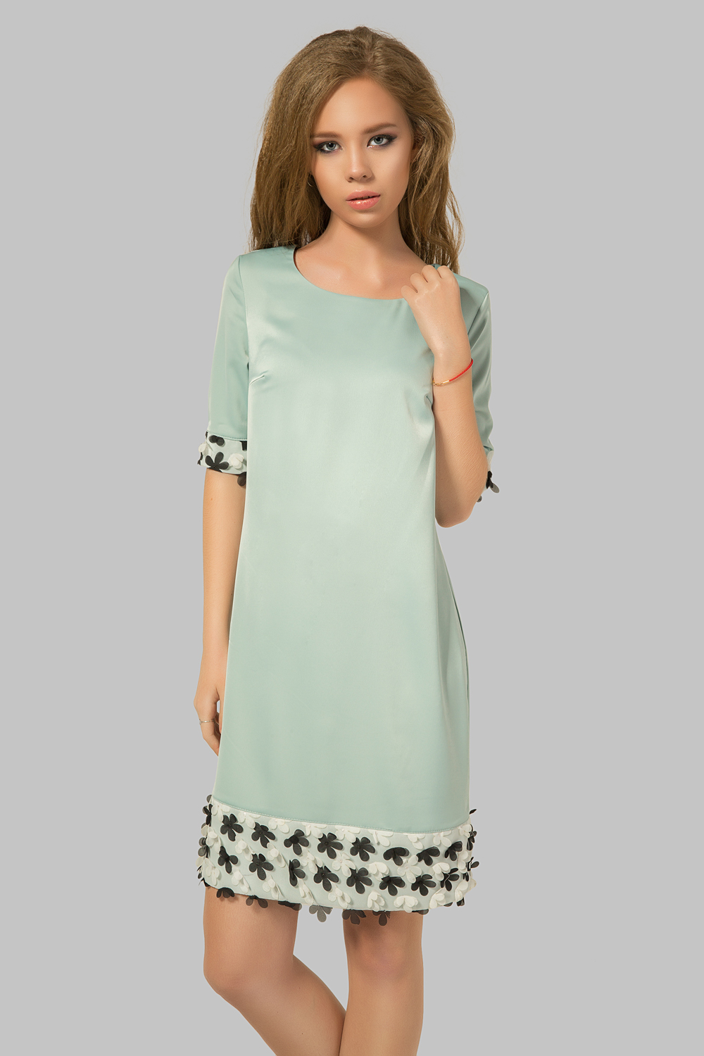 Dress with floral trim in sage colour