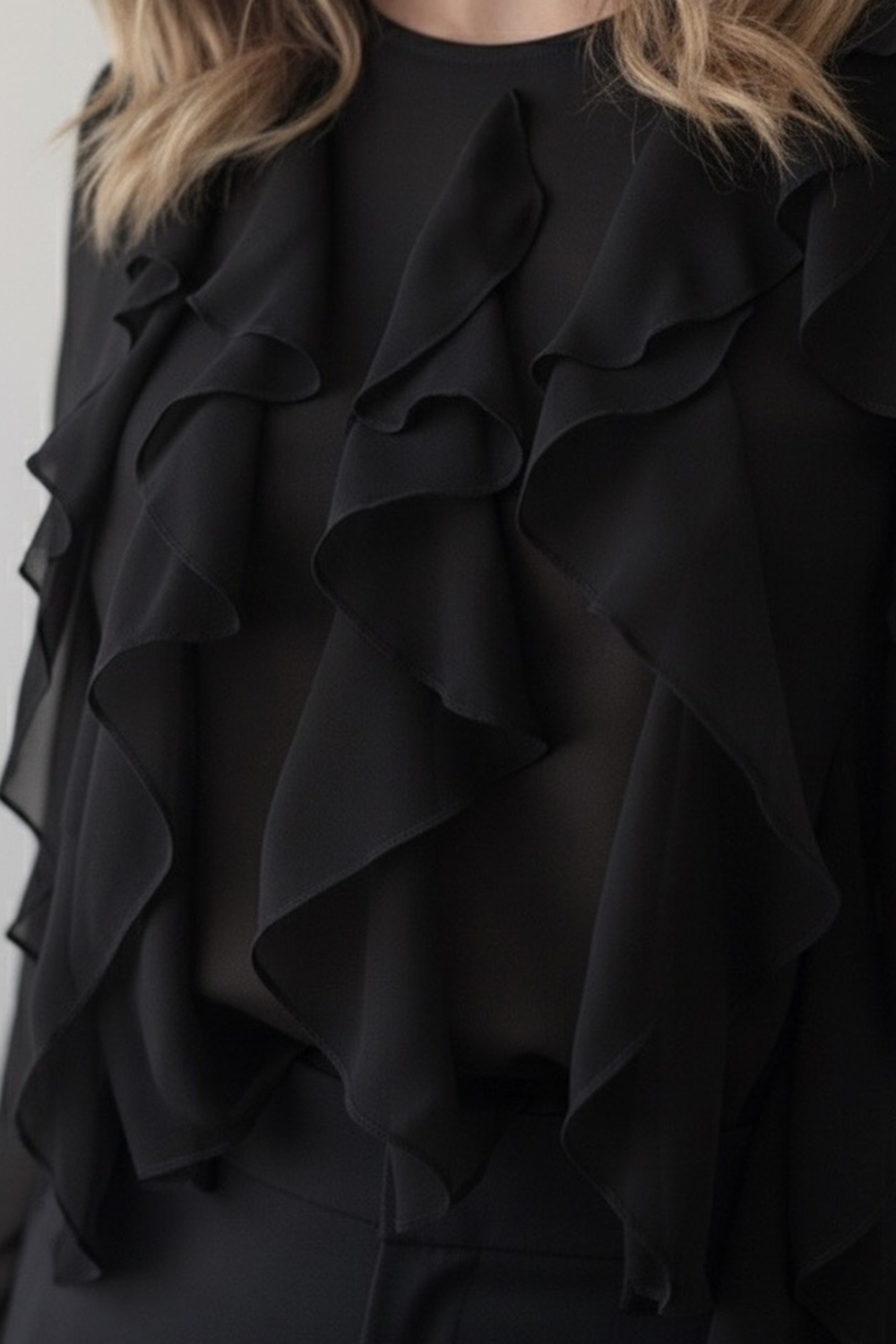 Black long sleeve shirt with ruffles