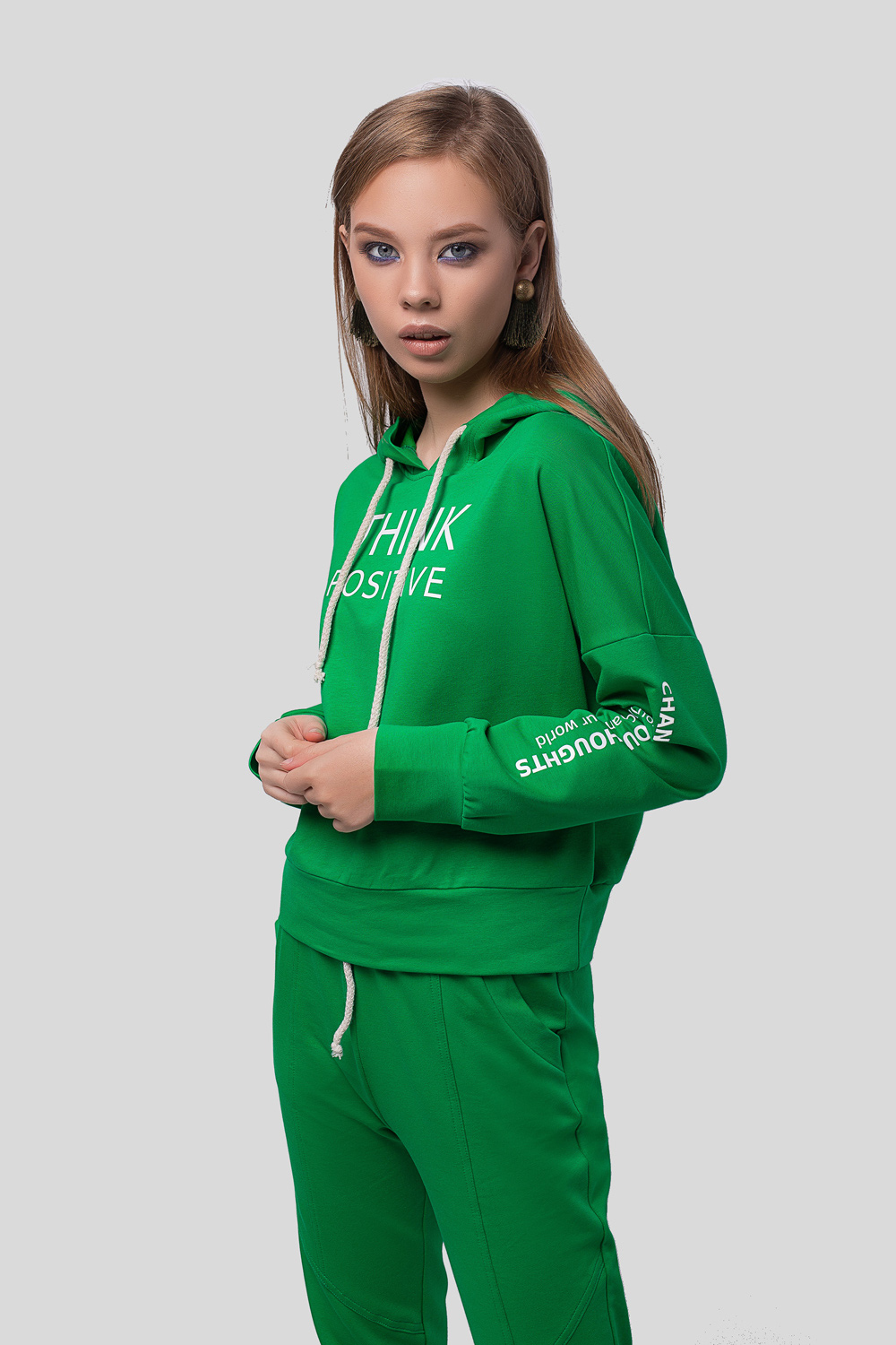 Green hoodie with a slogan