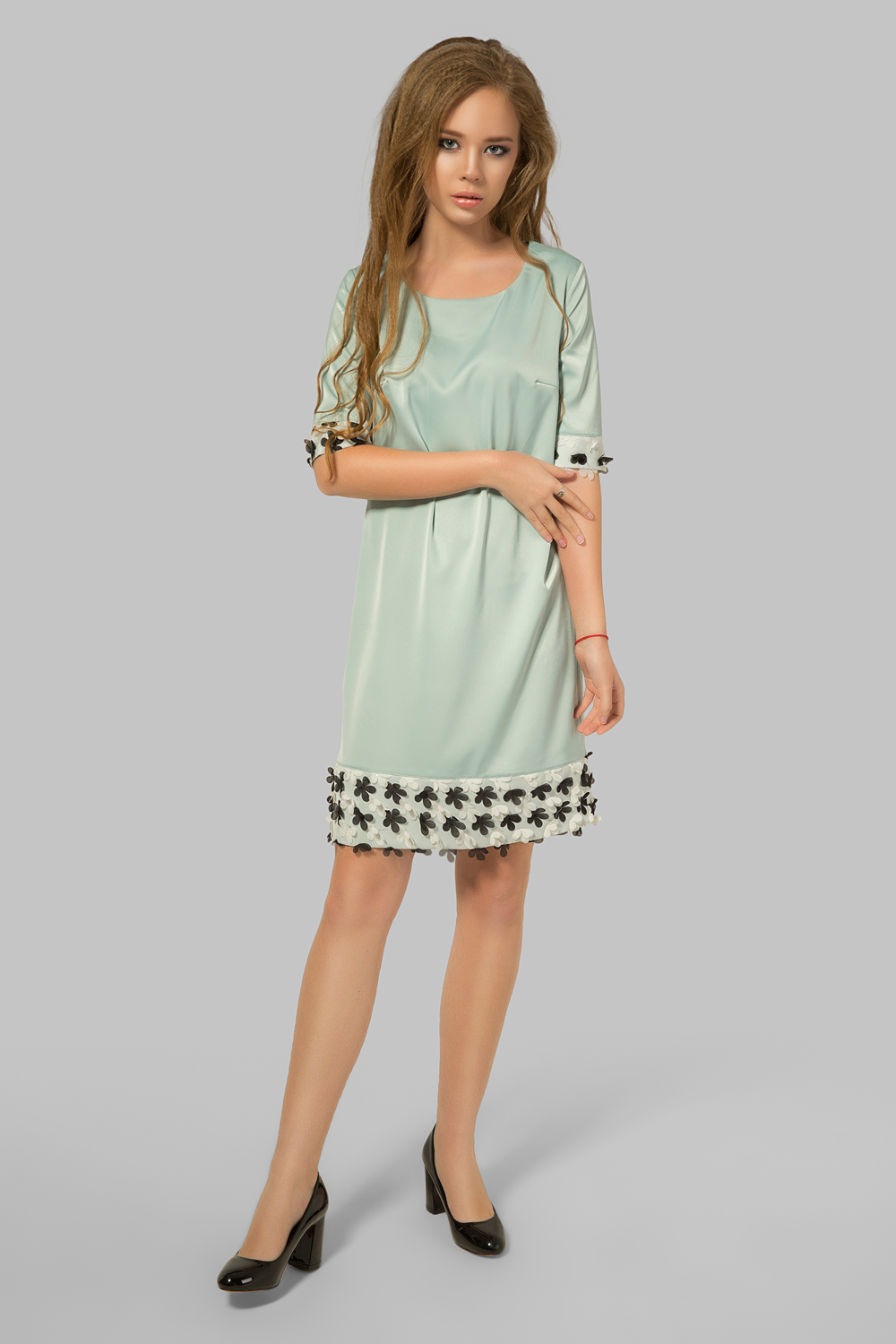 Dress with floral trim in sage colour