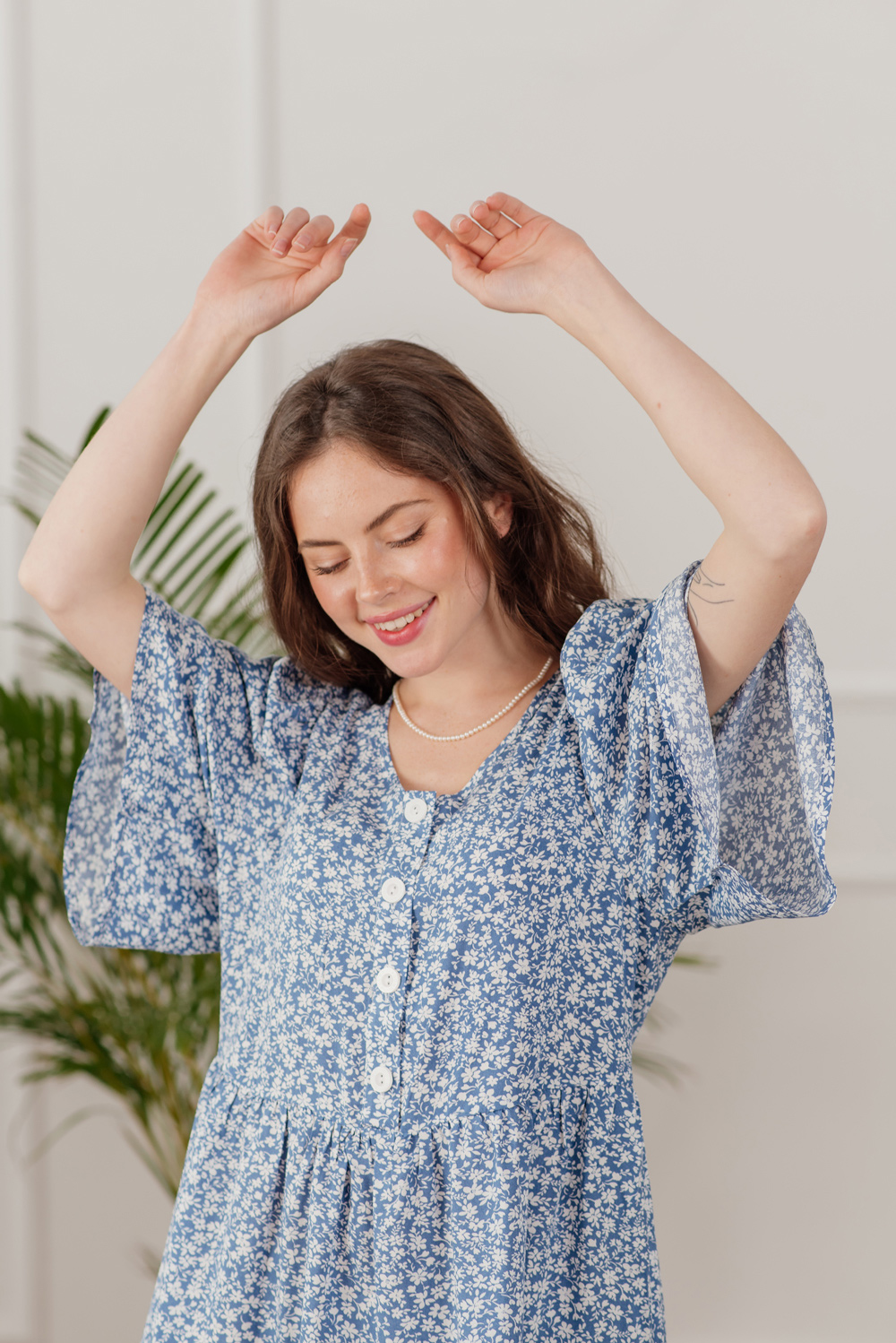 Blue dress with buttons and flounce