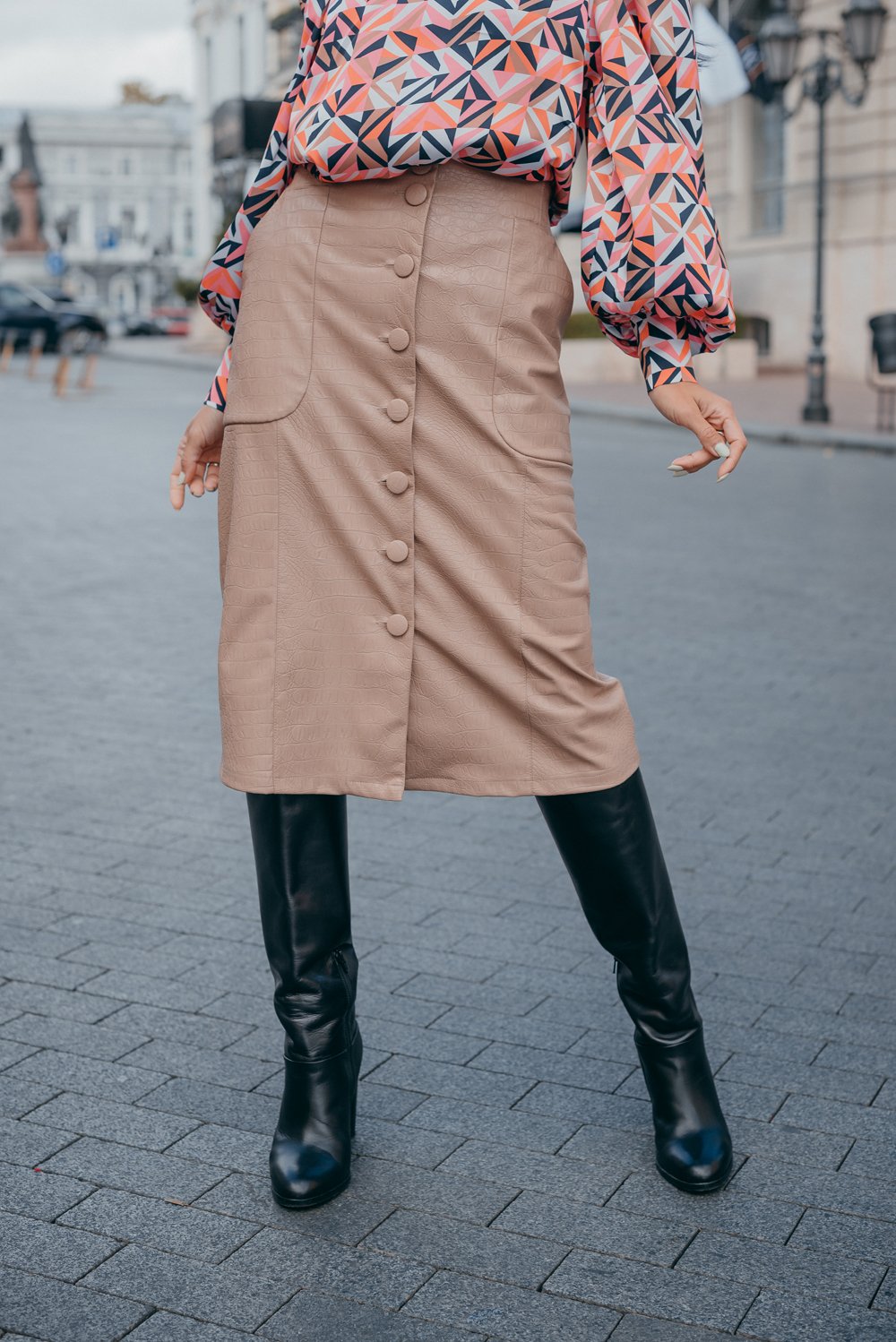 Midi skirt made of eco leather with buttons