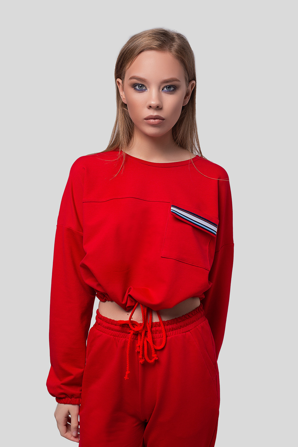 Red sweatshirt with a drawstring