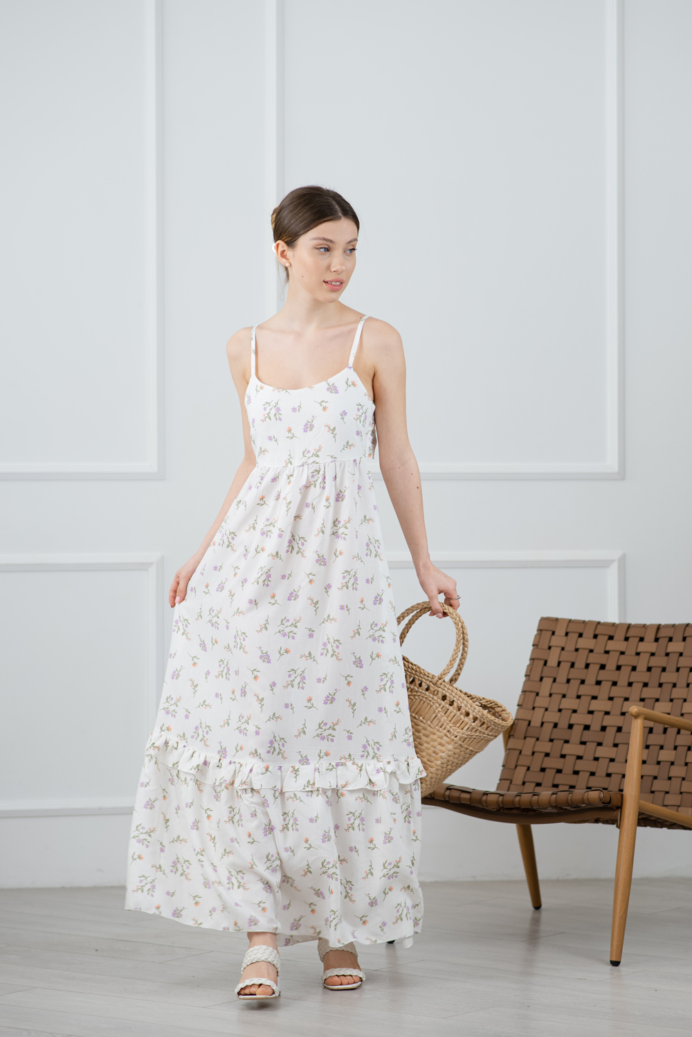 Dairy sundress of a semi-fitted silhouette.