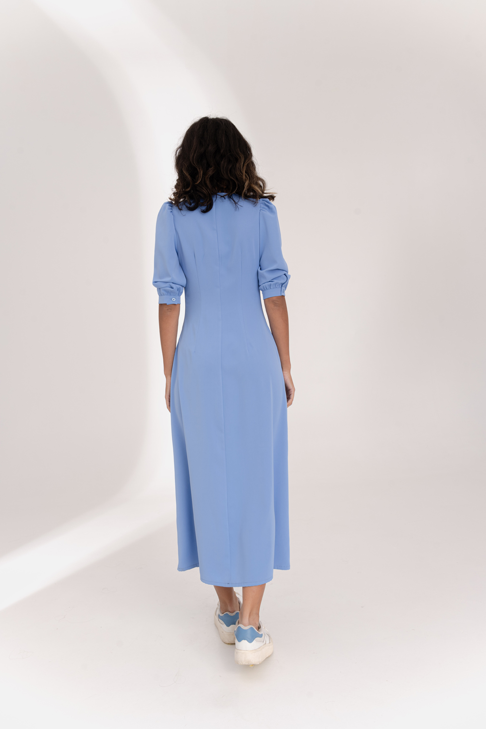 Blue flowy dress with ruching at the chest