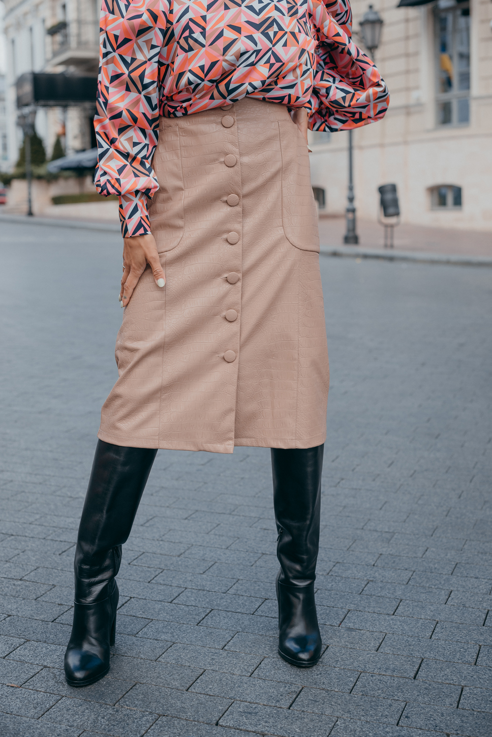 Midi skirt made of eco leather with buttons