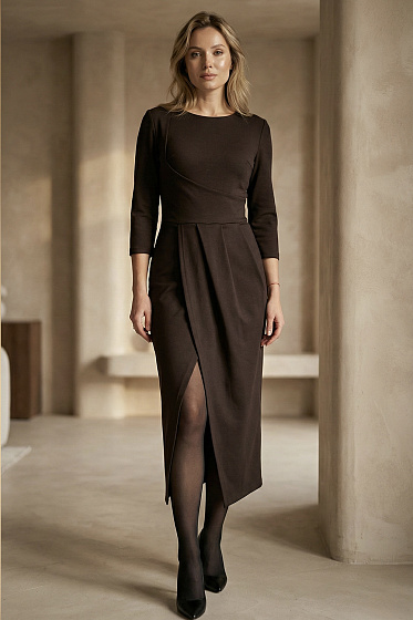 This elegant, form-fitting midi dress, crafted from soft knit, flatters the figure without restricting movement and fits comfortably. The asymmetrical wrap skirt with delicate pleats visually elongates the silhouette and conceals curves around the waist and hips. Three-quarter sleeves and a neat back zipper make this dress versatile—suitable for everything from daytime to evening wear.