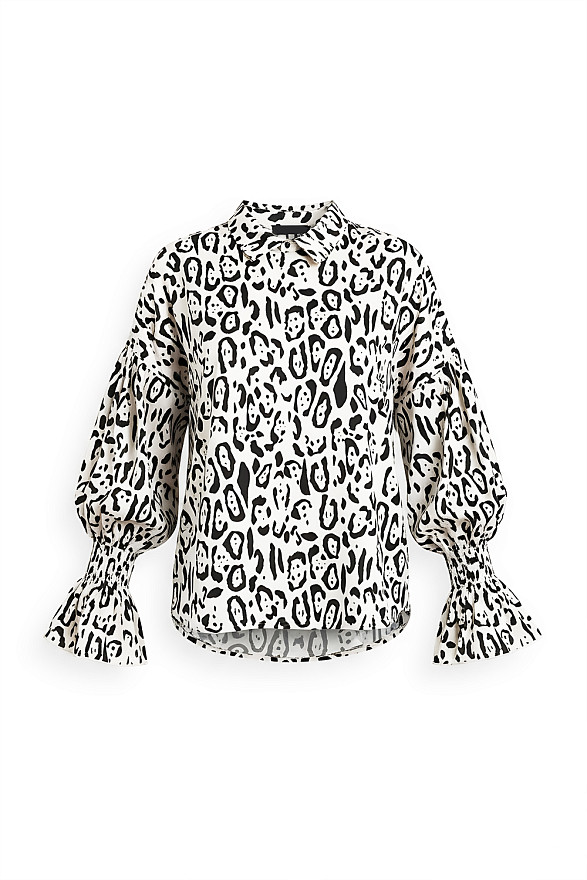 Cream-colored loose-fitting shirt