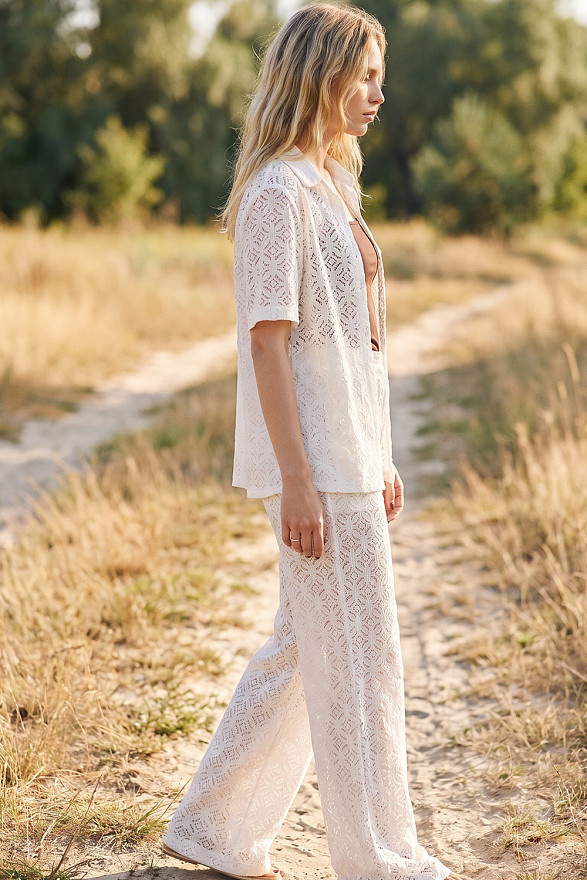 Milk-colored women's guipure suit