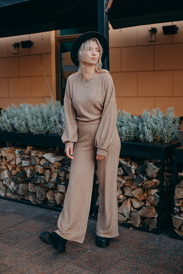 Beige knit flared trousers