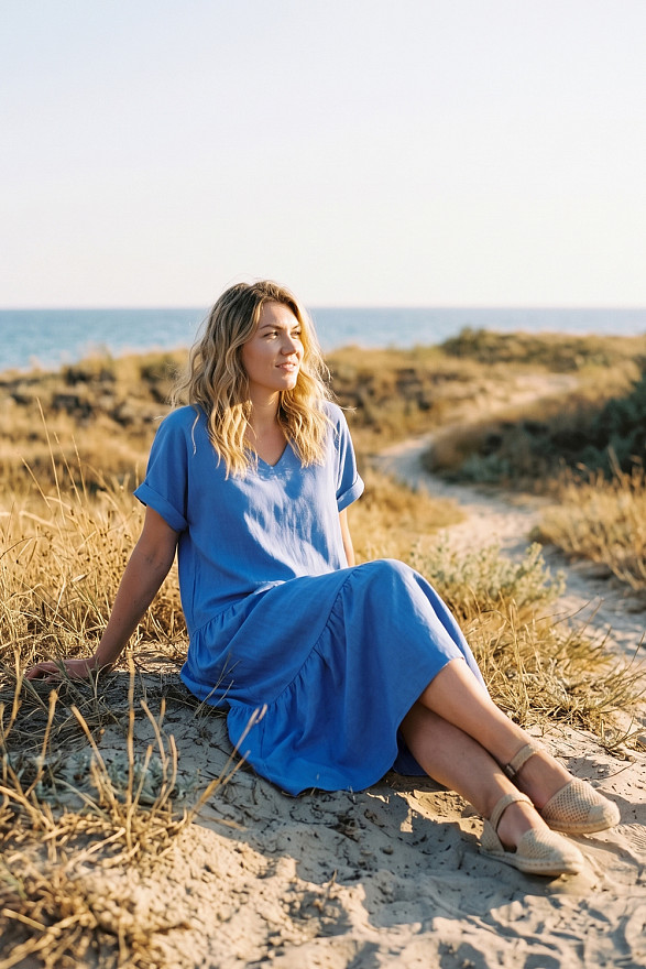Light blue V-neck midi dress with wide ruffles