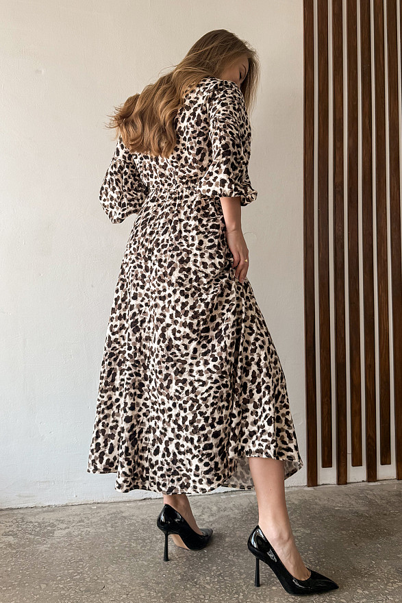 Loose midi dress with elastic band, V-neck and puff sleeves