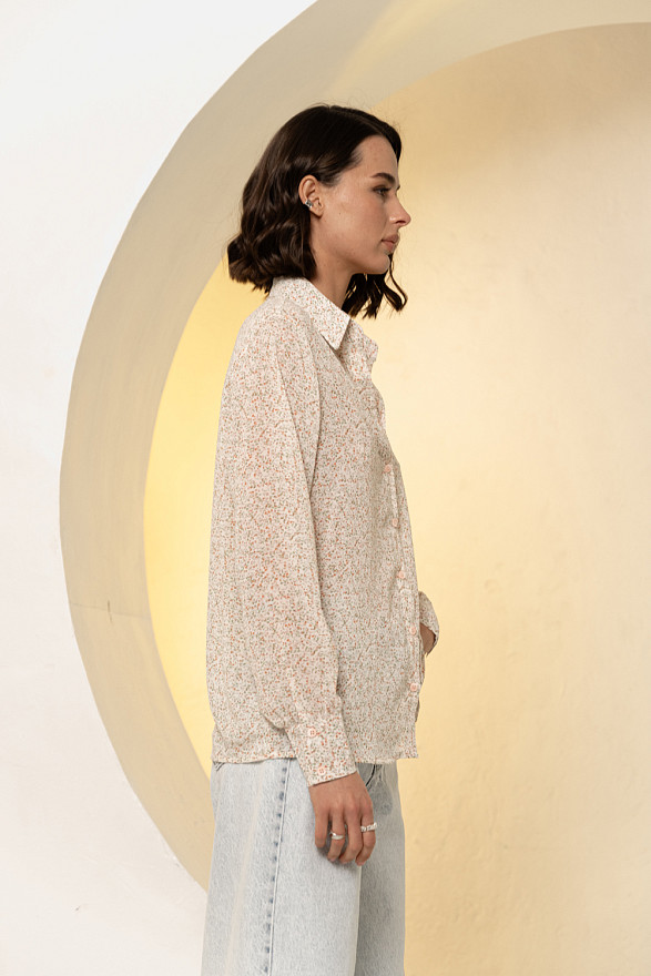 Кремова блуза вільного крою