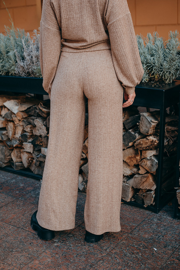 Beige knit flared trousers