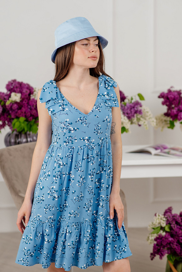 Light blue mini dress with bows on the shoulders