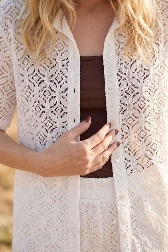 Milk-colored women's guipure suit