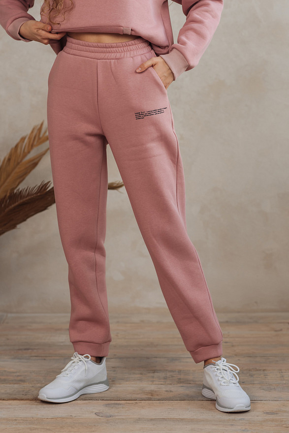 Пудрові спортивні штани з написом
