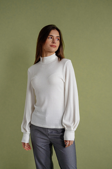 Soft jersey golf with a neckline and cuffed sleeves.