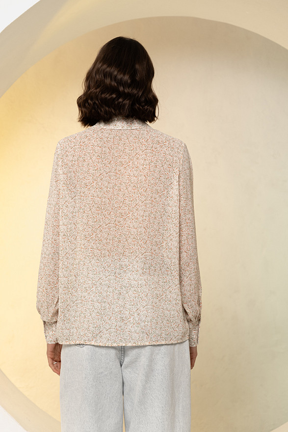 Кремова блуза вільного крою