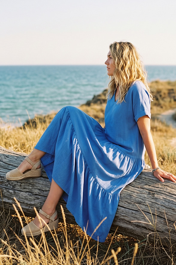 Light blue V-neck midi dress with wide ruffles