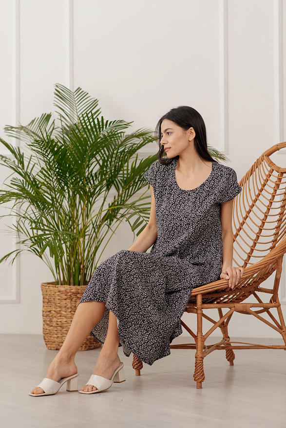 Black cotton dress with ruffles